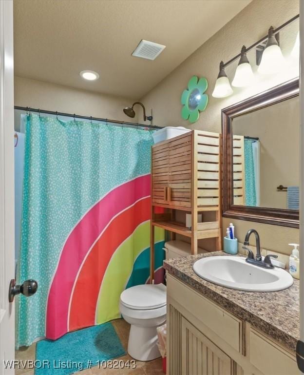 1112 Persimmon St, Greenwood, AR 72936 - bathroom featuring vanity, curtained shower, and recessed lighting