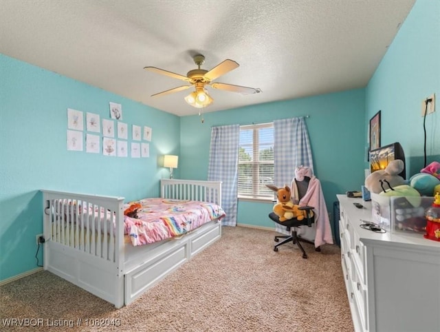 1112 Persimmon St, Greenwood, AR 72936 - carpeted bedroom with a textured ceiling and a ceiling fan