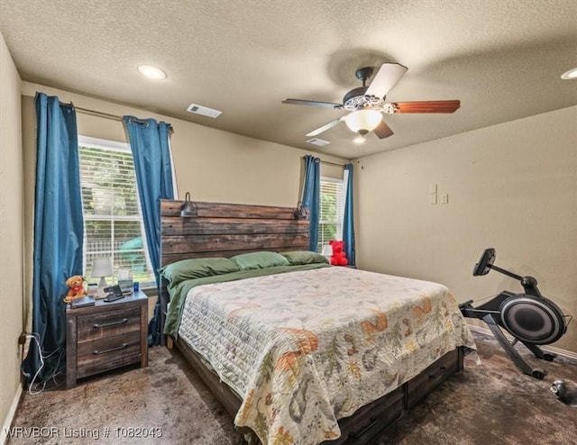 1112 Persimmon St, Greenwood, AR 72936 - carpeted bedroom featuring a textured ceiling, a ceiling fan, and recessed lighting