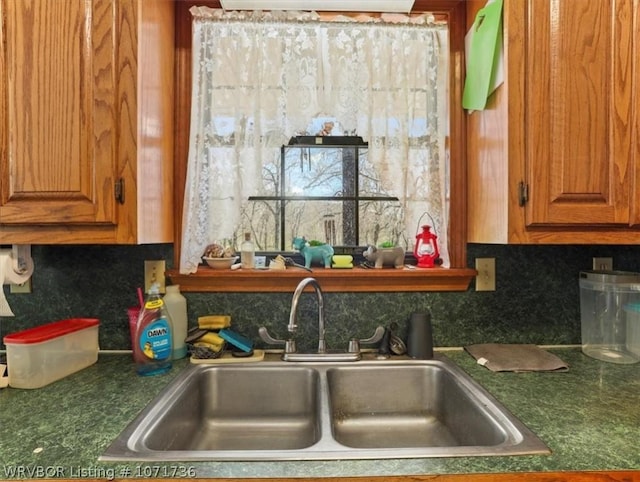 87387 S 4719, Stilwell, OK 74960 - kitchen with decorative backsplash and sink