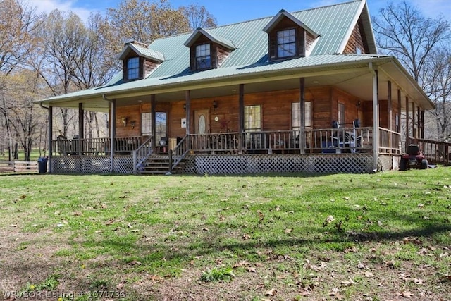 farmhouse inspired home featuring a porch and a front yard