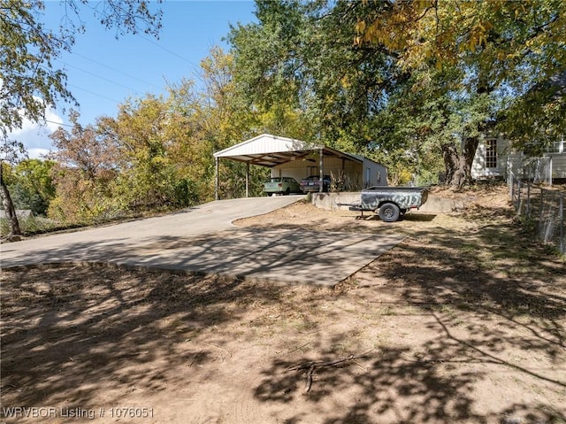 view of yard featuring a carport