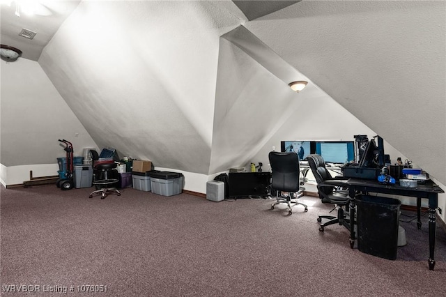 office space featuring lofted ceiling and a textured ceiling