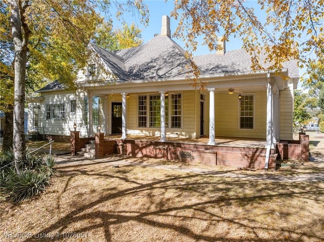 back of house with covered porch