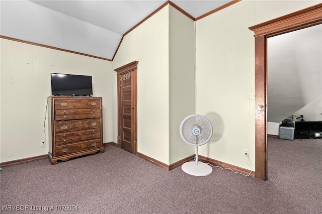 bedroom featuring light colored carpet and vaulted ceiling