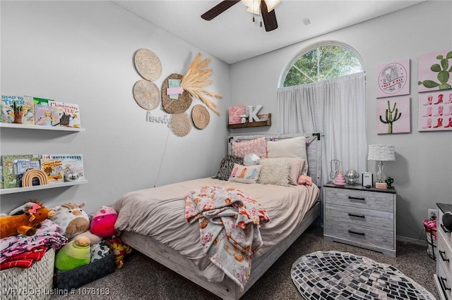 carpeted bedroom featuring ceiling fan and lofted ceiling