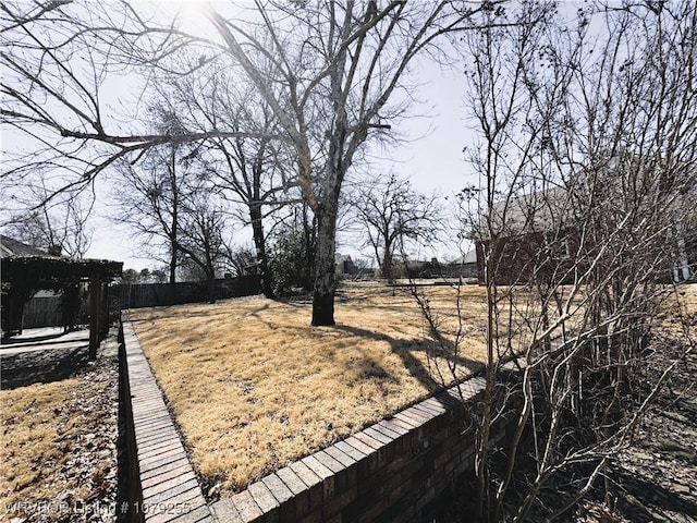 view of yard featuring fence