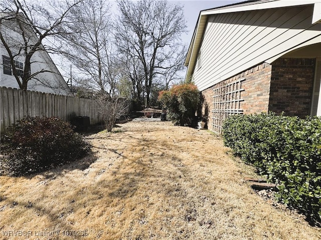 view of yard featuring fence