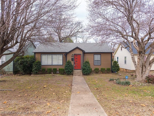 view of front of home with a front yard