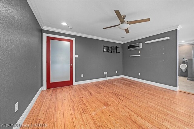 unfurnished room with light hardwood / wood-style flooring, ceiling fan, and crown molding