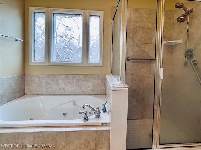 bathroom with independent shower and bath