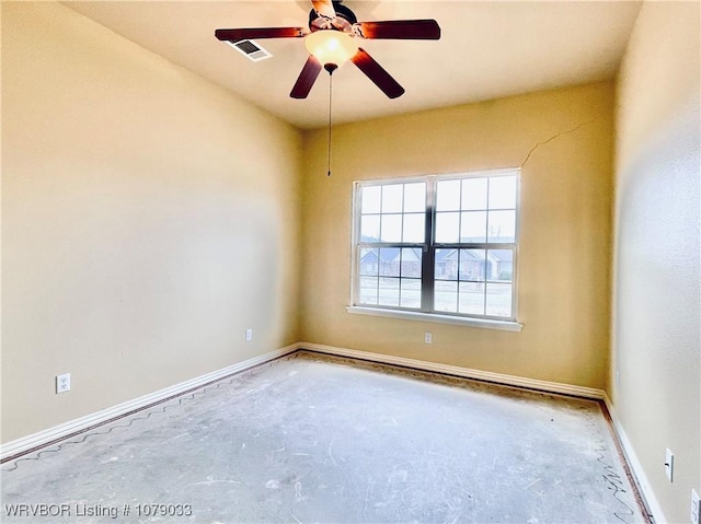 unfurnished room featuring concrete flooring and ceiling fan