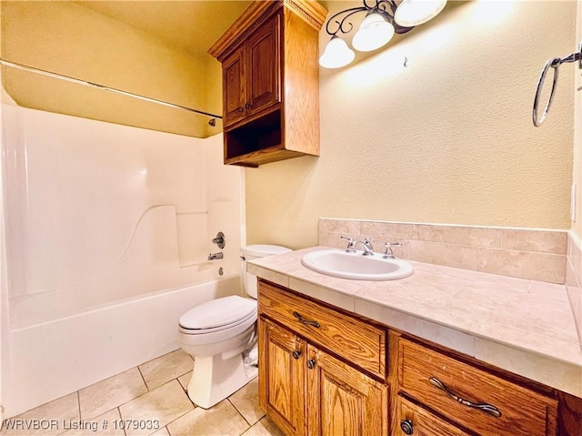 full bathroom featuring bathtub / shower combination, vanity, toilet, and tile patterned flooring