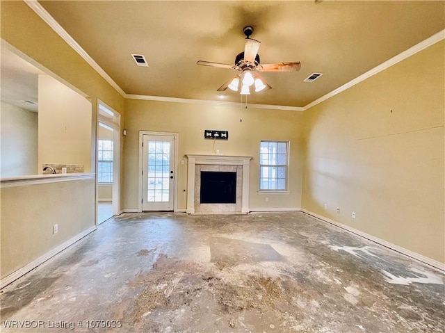 unfurnished living room featuring ornamental molding, a wealth of natural light, concrete floors, and a fireplace