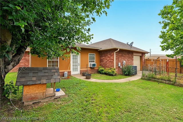 1524 Bunker Hill Ct, Van Buren, AR 72956 - rear view of house featuring brick siding, central AC unit, and cooling unit