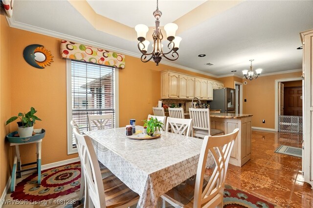 1524 Bunker Hill Ct, Van Buren, AR 72956 - dining area with a chandelier, baseboards, ornamental molding, and tile patterned floors