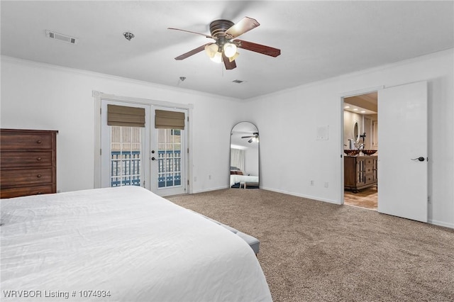 carpeted bedroom with ceiling fan, access to exterior, crown molding, and french doors