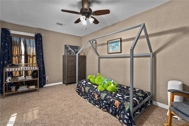 bedroom featuring carpet and ceiling fan