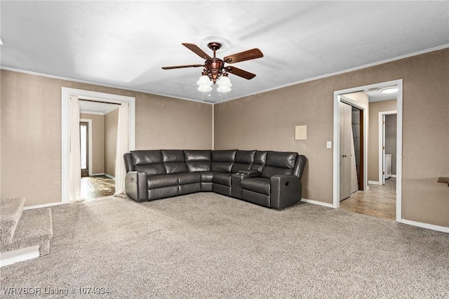 living room with light carpet, ceiling fan, and ornamental molding