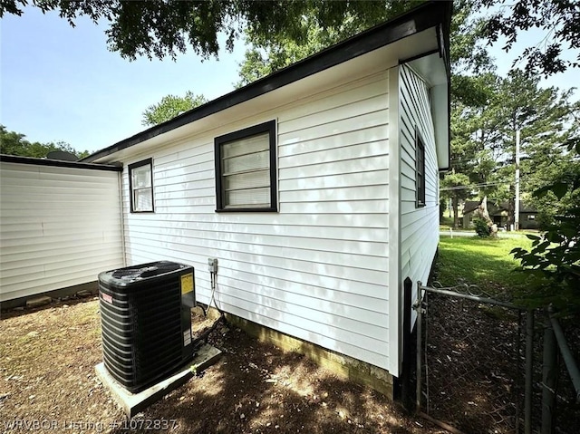 view of home's exterior with central air condition unit