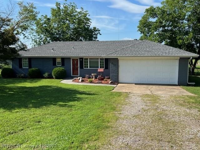 415 Francis Ln, Charleston, AR 72933 - ranch-style house with driveway, an attached garage, and a front yard