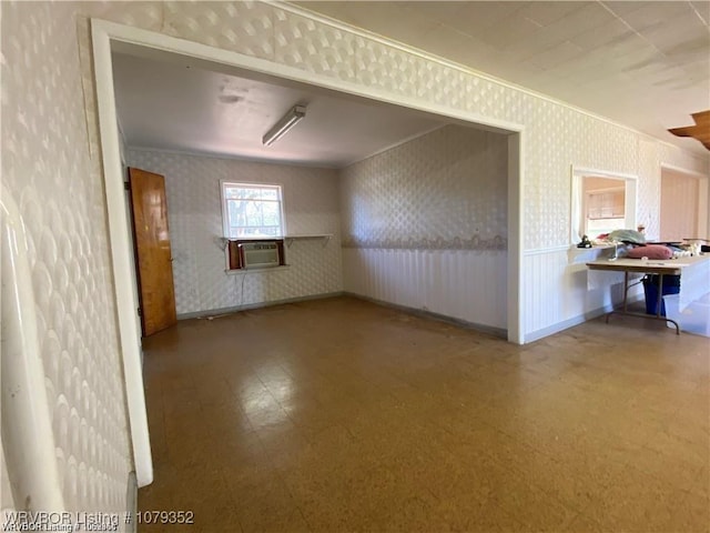 unfurnished room featuring crown molding, wallpapered walls, cooling unit, baseboards, and tile patterned floors