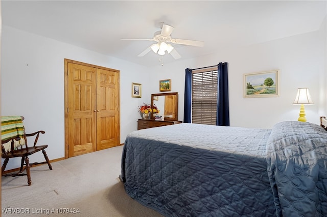 bedroom featuring carpet flooring, a ceiling fan, and baseboards