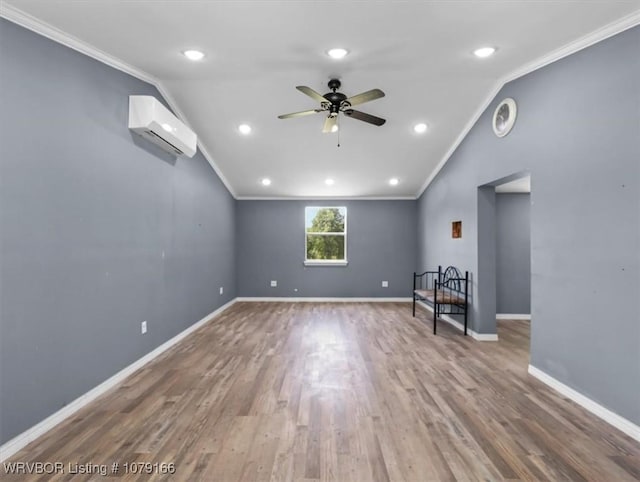 23805 270th Hwy, Howe, OK 74940 - empty room with lofted ceiling, a ceiling fan, a wall mounted air conditioner, wood finished floors, and baseboards
