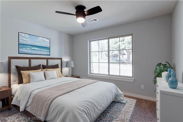 407 W Beech St, Greenwood, AR 72936 - carpeted bedroom featuring baseboards and a ceiling fan