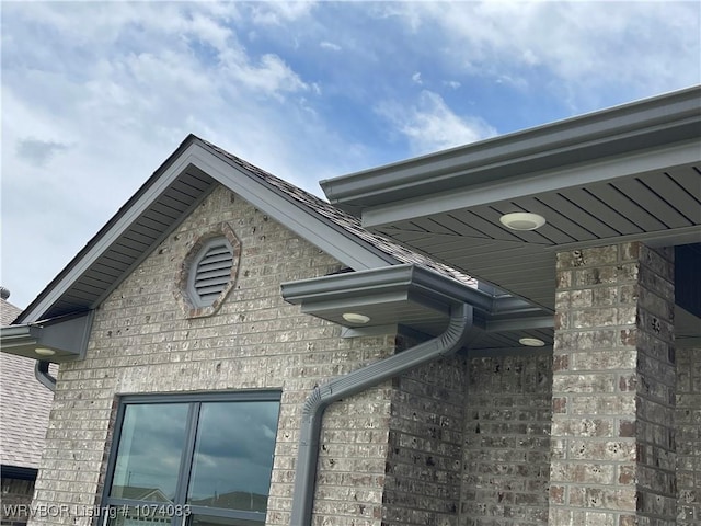 9114 Maysview Ln, Fort Smith, AR 72916 - exterior view of gutters, a downspout, and brick siding