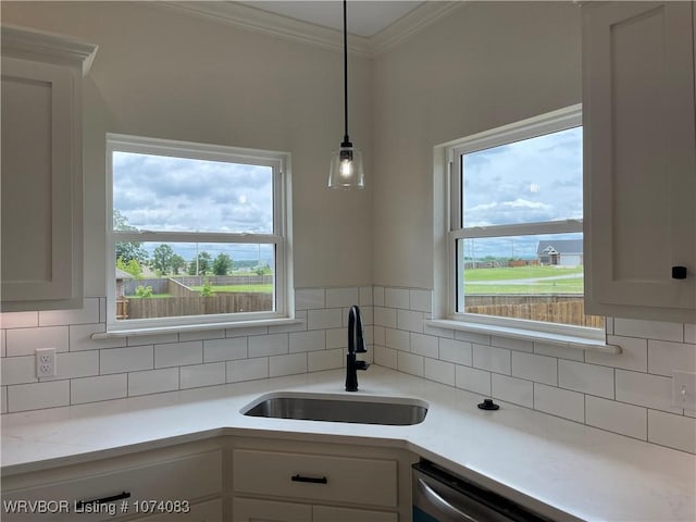 9114 Maysview Ln, Fort Smith, AR 72916 - kitchen with a sink, ornamental molding, tasteful backsplash, light countertops, and white cabinets