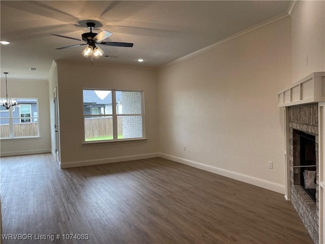 9114 Maysview Ln, Fort Smith, AR 72916 - unfurnished living room featuring crown molding, dark wood-type flooring, baseboards, a chandelier, and a fireplace