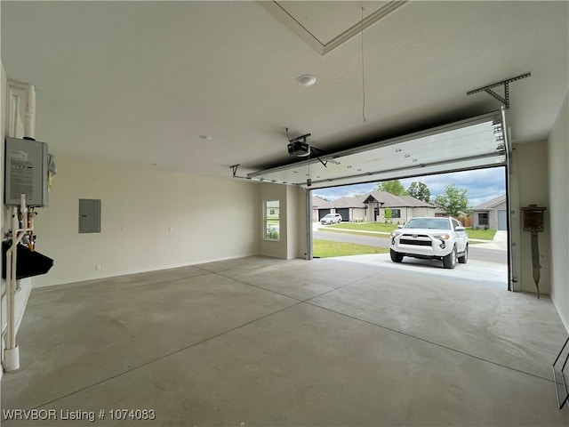 9114 Maysview Ln, Fort Smith, AR 72916 - garage featuring electric panel and a garage door opener
