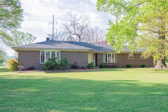 935 Florence Cir, Mulberry, AR 72947 - back of property with a yard and brick siding