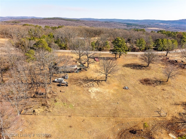 birds eye view of property featuring a rural view