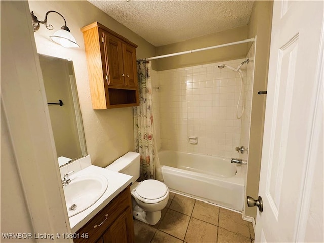 9506 Londonderry Ct, Fort Smith, AR 72908 - bathroom with a textured ceiling, vanity, shower / bath combo with shower curtain, and tile patterned flooring