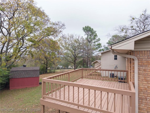 deck with a storage shed