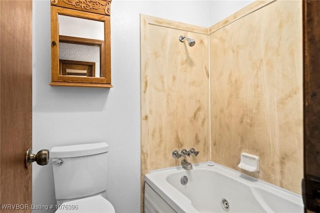 bathroom with toilet and shower / bathtub combination