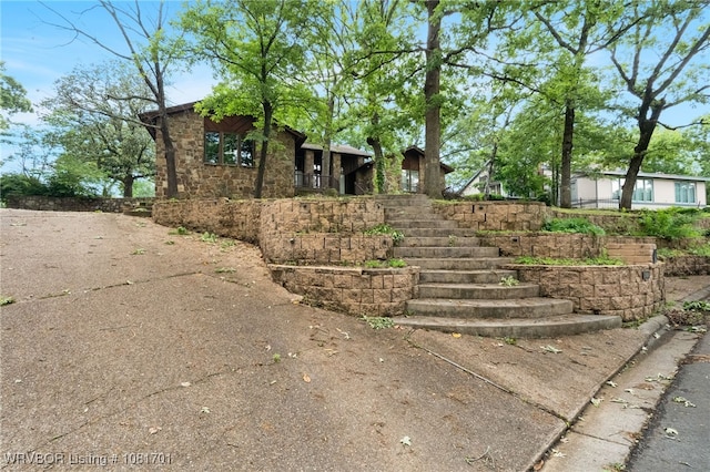 1808 Bramble Brae St, Fort Smith, AR 72908 - view of property exterior featuring stairway and stone siding