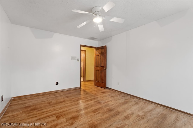 1808 Bramble Brae St, Fort Smith, AR 72908 - empty room with light wood finished floors and a ceiling fan