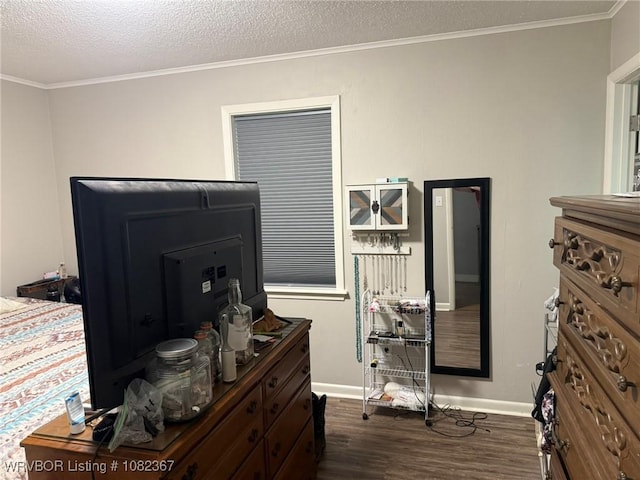 309 N 25th St, Ozark, AR 72949 - bedroom featuring dark wood-style floors, a textured ceiling, and crown molding