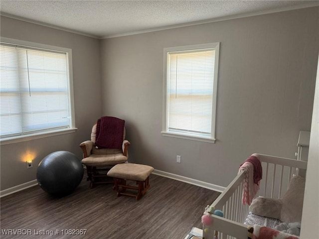 309 N 25th St, Ozark, AR 72949 - bedroom featuring wood finished floors, a crib, multiple windows, a textured ceiling, and crown molding