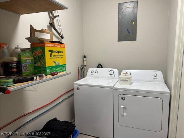 309 N 25th St, Ozark, AR 72949 - laundry area with electric panel and washing machine and dryer