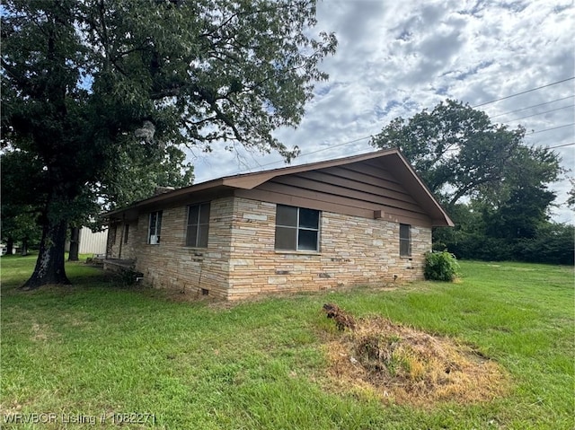 3928 N 59th Hwy, Van Buren, AR 72956 - view of home's exterior with stone siding and a yard