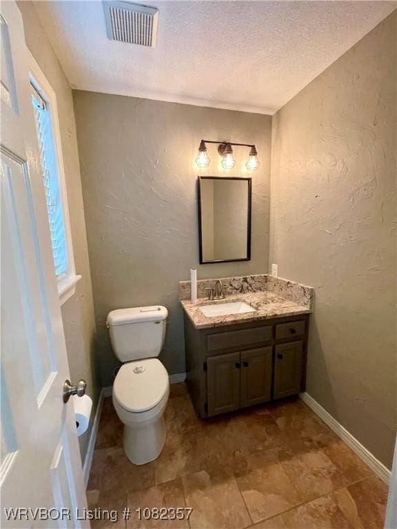 4104 Glen Flora Way, Fort Smith, AR 72908 - half bathroom featuring vanity and a textured ceiling