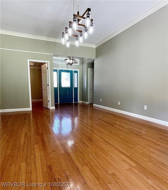 4104 Glen Flora Way, Fort Smith, AR 72908 - empty room with a chandelier, crown molding, and wood-type flooring