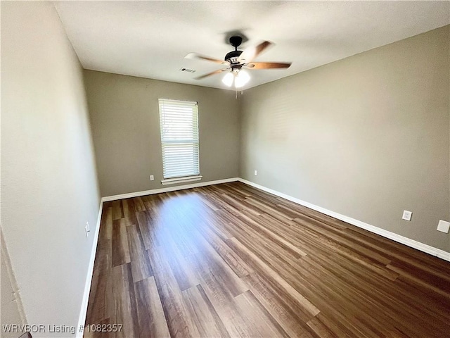 4104 Glen Flora Way, Fort Smith, AR 72908 - empty room featuring a ceiling fan and dark wood-type flooring