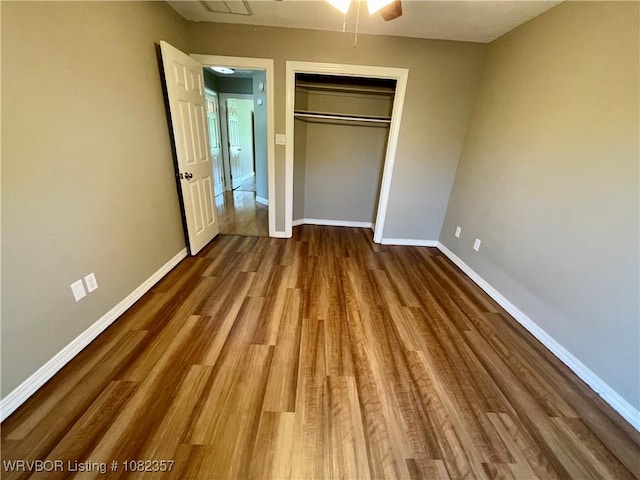4104 Glen Flora Way, Fort Smith, AR 72908 - unfurnished bedroom with wood finished floors, a closet, and a ceiling fan