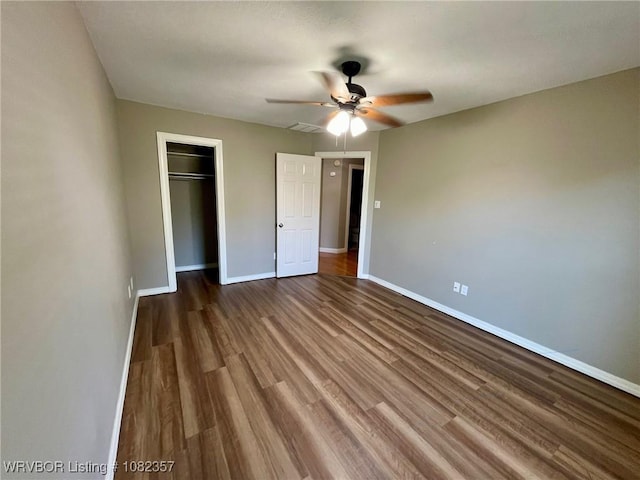 4104 Glen Flora Way, Fort Smith, AR 72908 - unfurnished bedroom with a closet, wood finished floors, and a ceiling fan