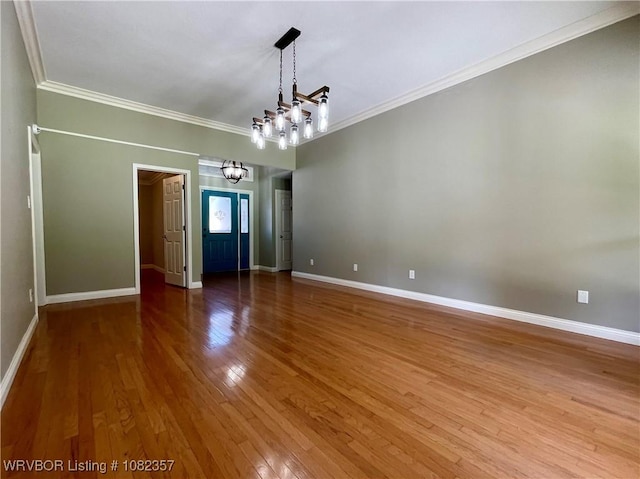 4104 Glen Flora Way, Fort Smith, AR 72908 - unfurnished room with a chandelier, ornamental molding, and wood finished floors